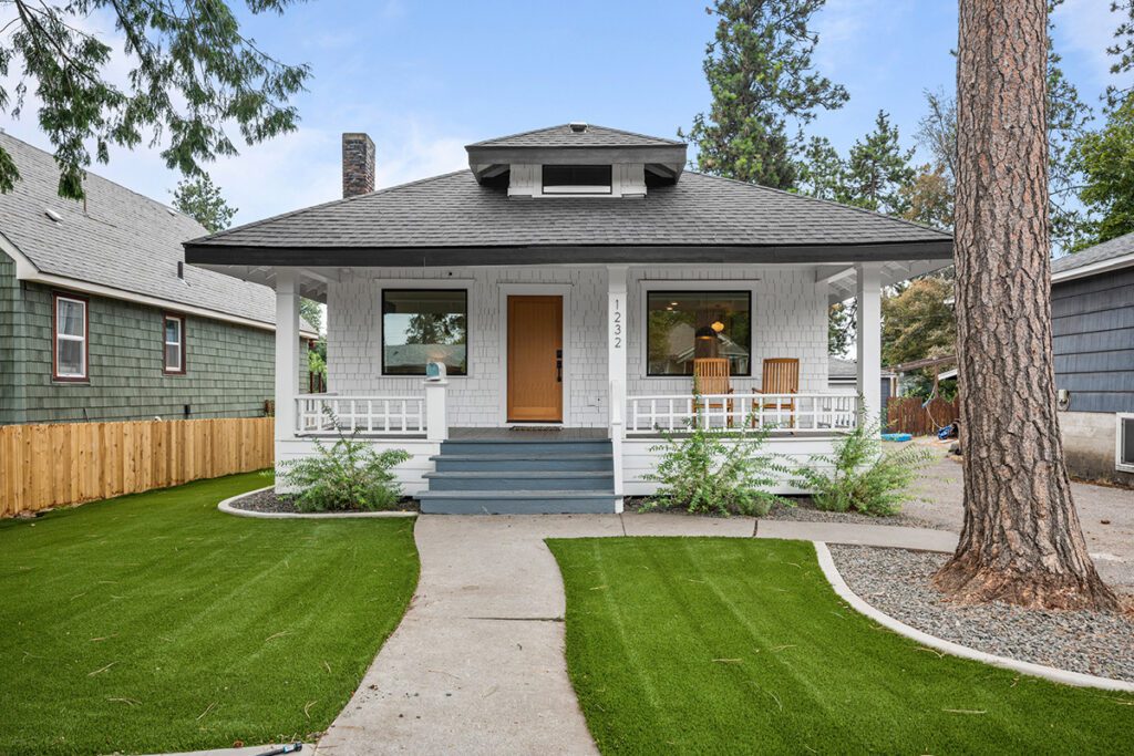 Artificial turf on the front lawn of a home.